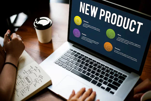 Designer working in a design tool on a laptop