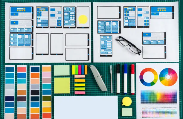 Product designer sketching flows