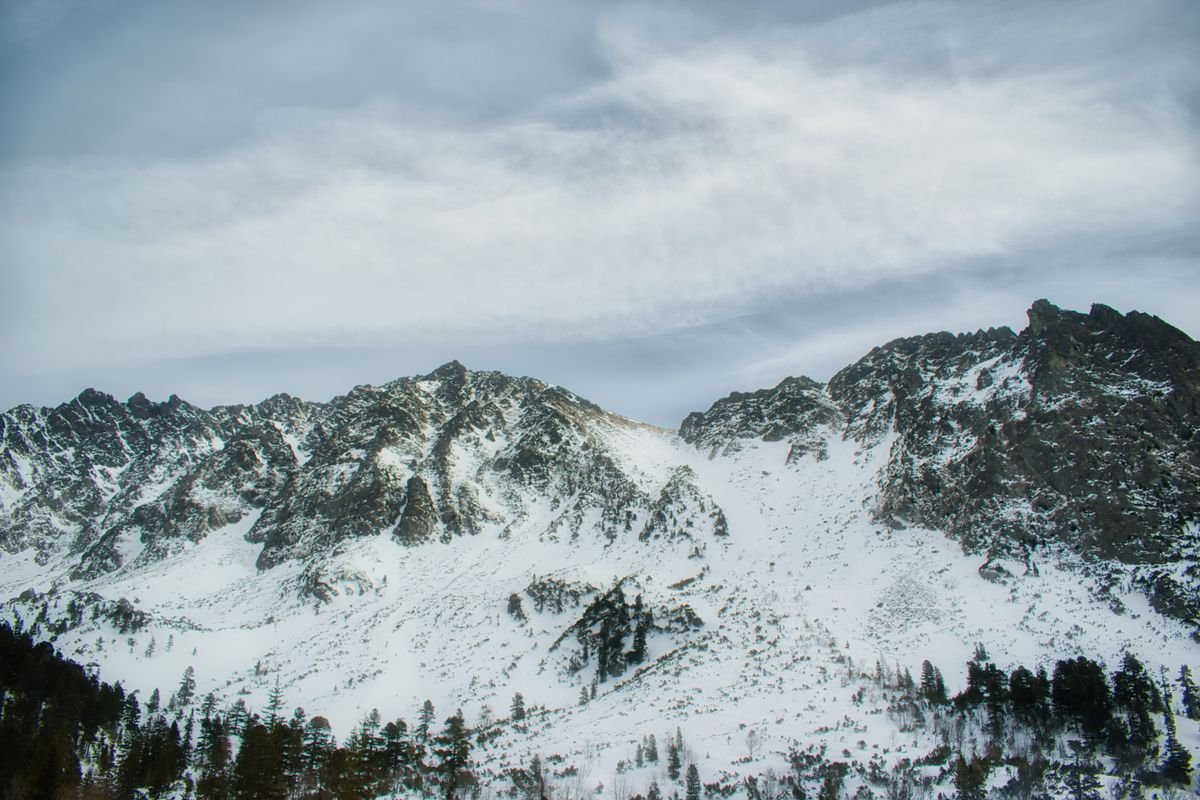 Laptop open on a small table while travelling