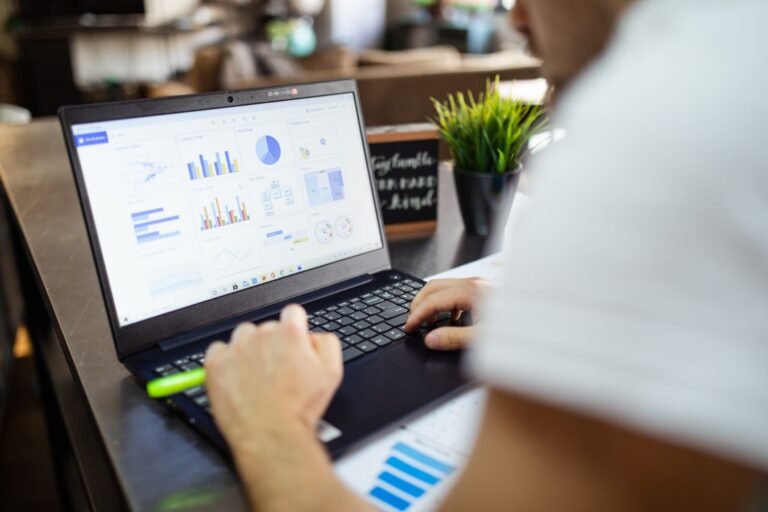 Data analysis on a laptop in an office