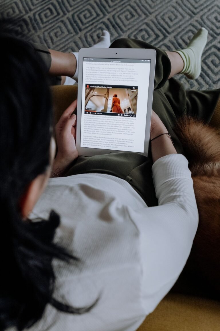 Person reading an article on a tablet
